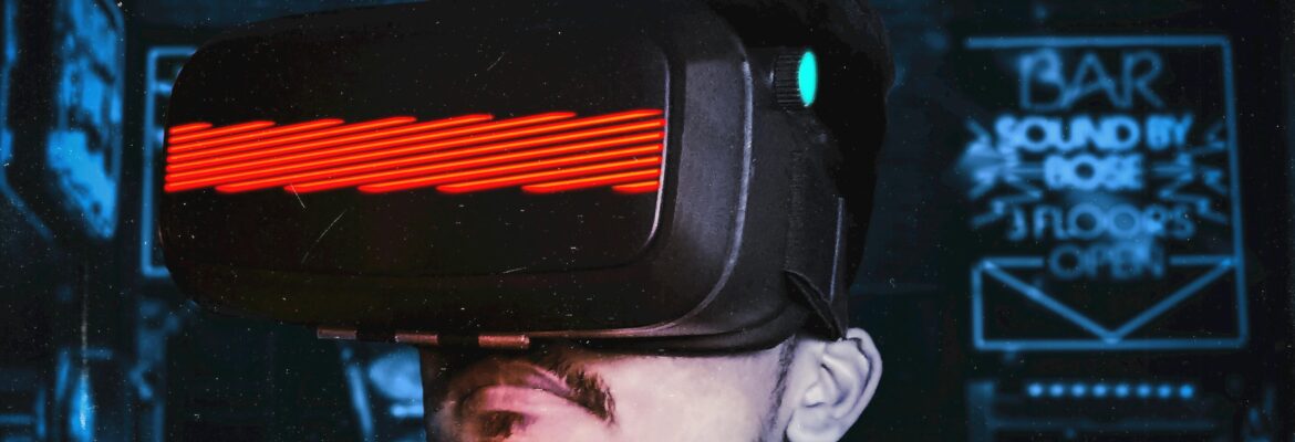 Young man immersed in a virtual reality experience using a VR headset, showcasing futuristic tech in a gaming environment.
